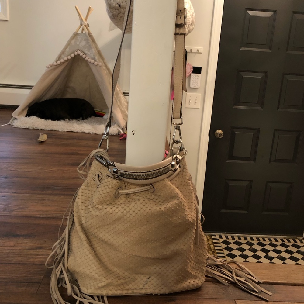 B. By Brian Atwood Blush Nude Bucket Bag